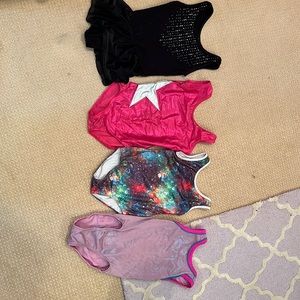 4 gymnastics leotards Size 5-6